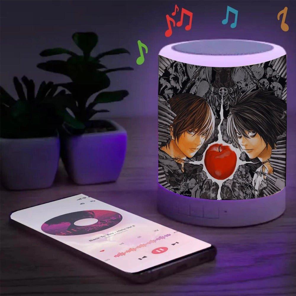 a table topped with a book and a cup 
