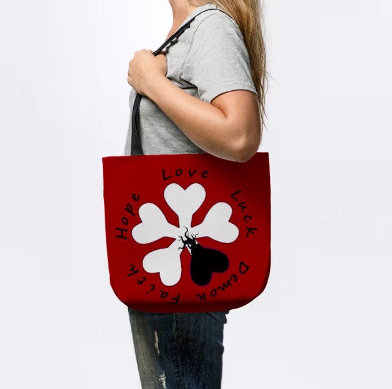 demonic clover tote bag