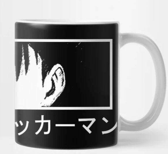 a coffee cup sitting on top of a table 