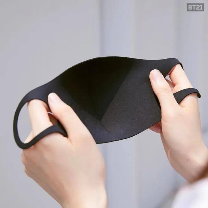 a person holding a cell phone in their hand 