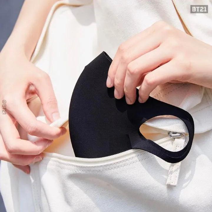 a person is holding a pair of scissors 